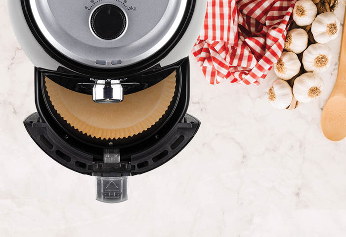 Kepimo popierius suderinamas su įvairiomis karšto oro gruzdintuvėmis su apvaliu krepšeliu.